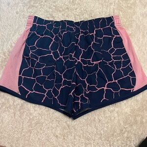 Pink giraffe print girls running shorts. Size: 14-16